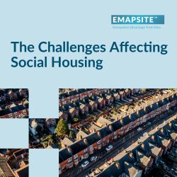 The Challenges Affecting Social Housing article title with a photo of houses, streets, gardens and cars in a UK town. 